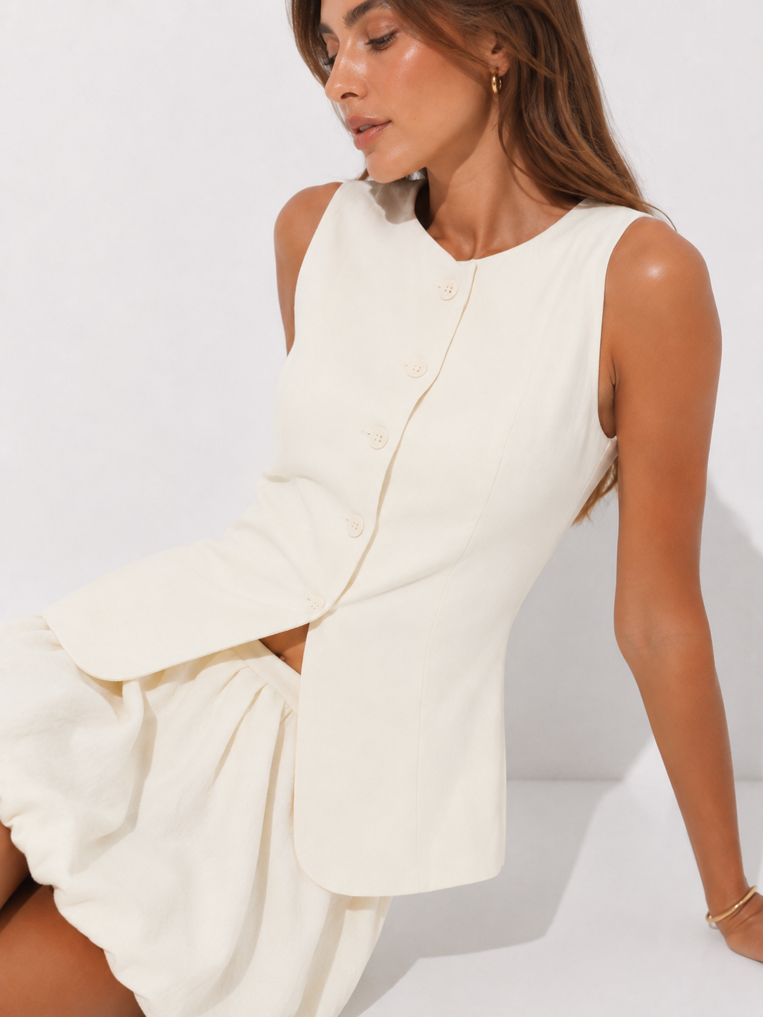 Tailored Two-Piece Set with Structured Vest and Pleated Mini Skirt